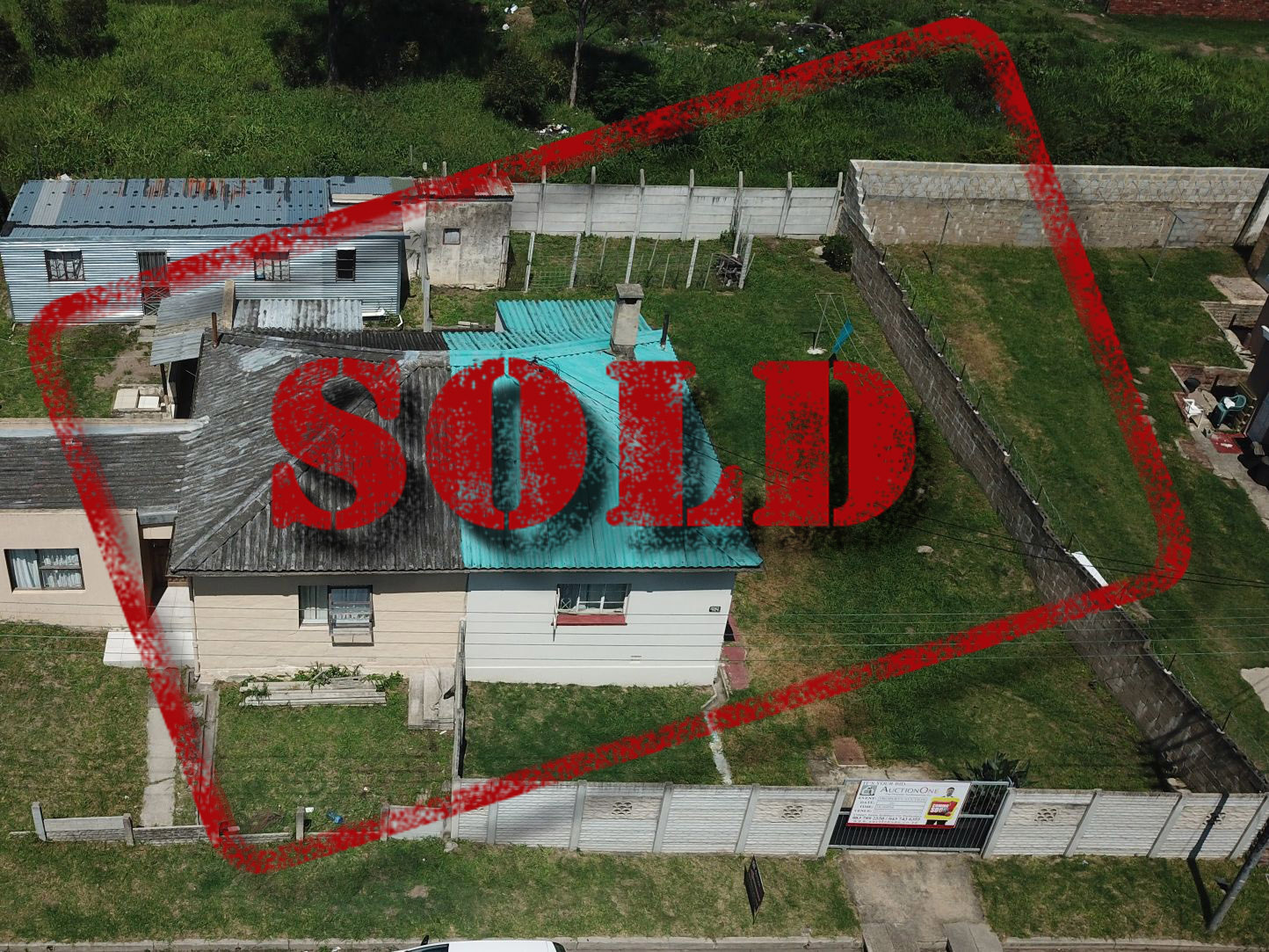 SOLD at auction 58 Evans Road, Milner Estate, East London. AuctionOne